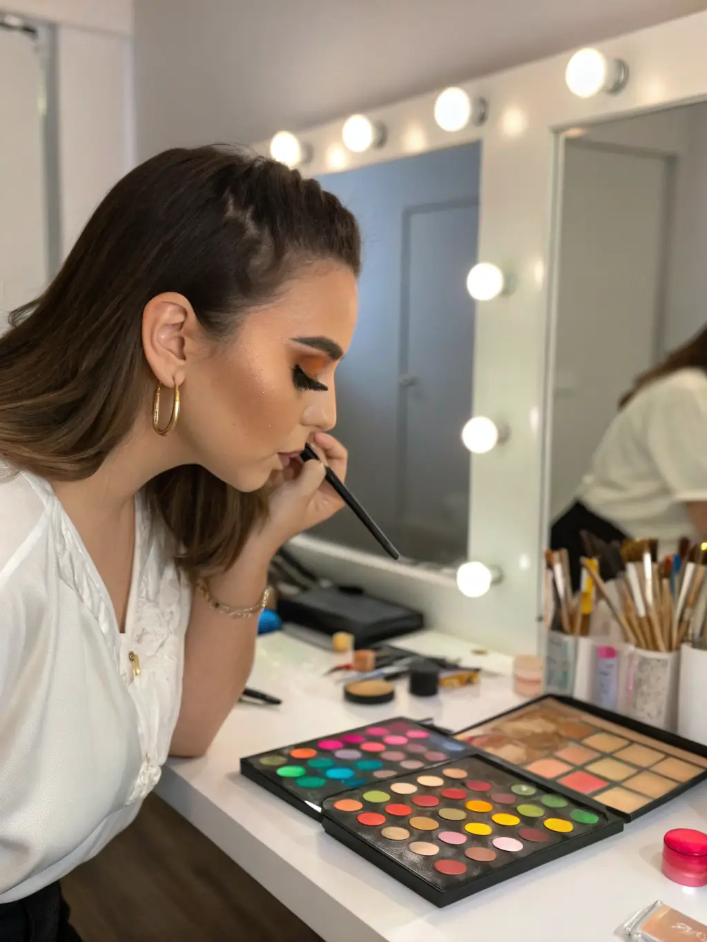 An influencer carefully selecting products for a seeding campaign, highlighting the personalized approach Stratos Agency takes to match influencers with brands.